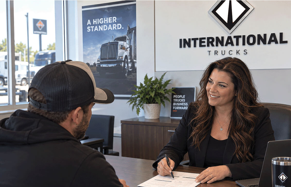 Woman Going Over Loan Options With Customer